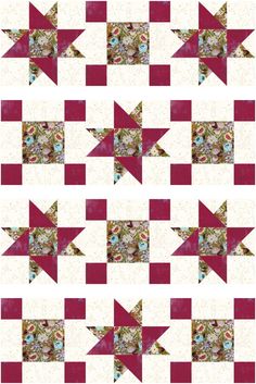 a red and white patchwork quilt with stars on the top, in different colors