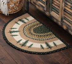 PRICES MAY VARY. 60 Day No Hassle Returns A Black Forest Decor Exclusive - A pine tree print brings warmth and tranquility to this half-round 100% natural jute rug. Spot clean. Rug liner recommended. 18"W x 29"L. Cabin Living Room Decor, Round Braided Rug, Cabin Rugs, Round Rug Living Room, Rustic Lake Houses, Ski Lodge Decor, Rustic Area Rugs, Rugs Ideas, Black Forest Decor