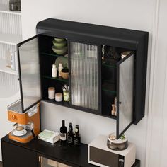 a black cabinet with glass doors and shelves