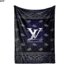 the louis vuitton bandana is hanging on a white wall and it's black