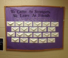 we came as strangers, we leave as friends bulletin board with envelopes on it