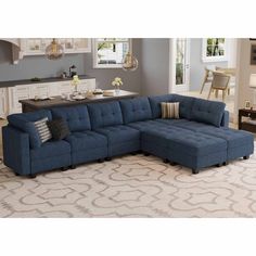 a blue sectional sofa in a living room