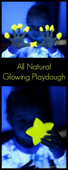 a child is playing with glow in the dark hands and yellow stars on their fingers