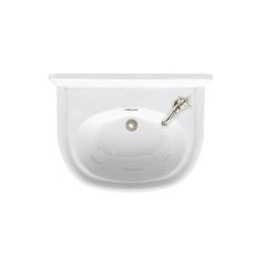 a white bathroom sink sitting under a faucet