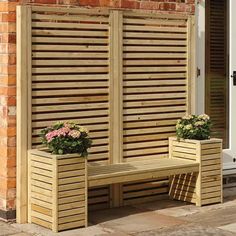 two wooden planters sitting next to each other near a brick wall with shutters