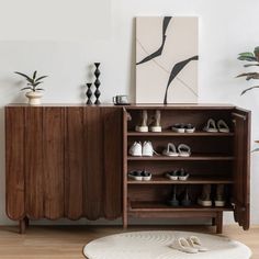 The core idea of the design is to make full use of the internal space to meet the storage needs of a family of three DICIXA | DICIXA Black Walnut Minimalist Shoe Cabinet Pair Solid Wood Shoe Storage Cabinet 39.37 H x 70.86 W x 15.35 D in Solid Wood in Brown | 36 | Wayfair Minimalist Shoe Cabinet, Wood Shoe Storage, Wood Organization, Wood Shoe, Teen Bedroom Furniture, Door Hardware Interior, Wood Shoes, Minimalist Shoes, Nursery Furniture Sets