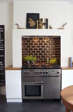 the kitchen is clean and ready to be used as a dining room or office space