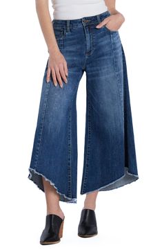 Pronounced distressing dances along the hem of these sweeping gaucho jeans cut from stretch-kissed denim with a heavily sanded finish. 24" inseam; 28" leg opening; 10 1/4" front rise 66% cotton, 22% REPREVE® recycled polyester, 8% polyester, 3% rayon, 1% spandex REPREVE recycled polyester is made from 100% post-consumer recycled plastic bottles Machine wash, tumble dry Imported Recycle Plastic Bottles, High Waisted Denim, Recycled Plastic, Plastic Bottles, Bottoms Pants, Jeans Pants, Womens Bottoms, Denim Jeans, Top Brands