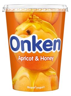 an orange yogurt with the word onken written in blue