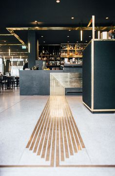 an image of a long wooden floor in a restaurant