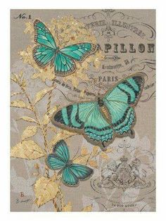 two blue butterflies sitting on top of a piece of paper with gold foil and leaves