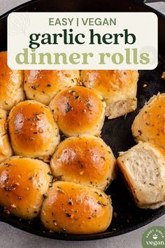 garlic herb dinner rolls in a cast iron skillet with text overlay that reads easy vegan garlic herb dinner rolls