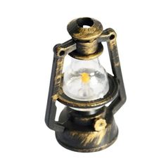 an old fashioned oil lamp with a small candle inside it on a white background photo