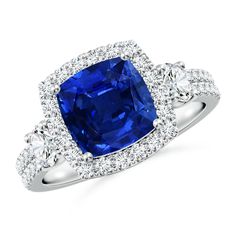 a blue sapphire and diamond ring in white gold