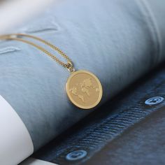 Gold Medallion Necklace, Map Pendant, Gold Coin Necklace, Gold Medallion, Global Citizen, Medallion Necklace, Charm Rings, Coin Necklace, Adjustable Necklace