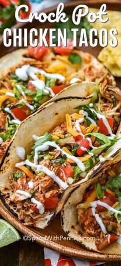 chicken tacos on a platter with ranch dressing