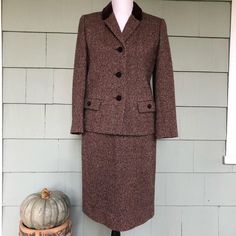 "Tailored perfection in this 1960 classic tweed tweed suit by Windsmoor London.  Flap pockets, brown velvet buttons and collar. Fully lined. Jacket and pencil skirt. Wonderful for mix and matching. Size small.  Jacket:  Bust 37 / Sleeve 21 / Length 23 Skirt:  Waist 26 / Hips 37 / Length 24.5 Pristine condition  ---- Registered in 1939, Windsmoor's style is associated with the traditional,  country side, English lady. \"Look your best in Windsmoor\"" Brown Tweed Jacket For Office, Classic Formal Tweed Dress, Elegant Brown Tweed Jacket With Button Closure, Classic Formal Tweed Dress With Buttons, Classic Fitted Tweed Dress With Button Closure, Classic Fitted Tweed Dress, Classic Winter Semi-formal Skirt Suit, Fitted Classic Tweed Dress With Button Closure, Fitted Classic Tweed Dress