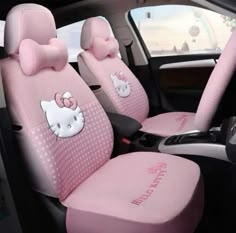 hello kitty car seat covers in pink with polka dots and bows on the front seats