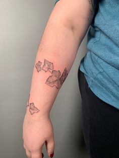 a person with a tattoo on their arm