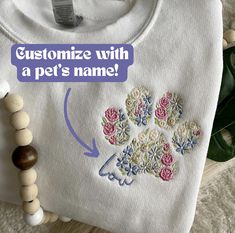 This cozy & comfy sweatshirt is the perfect gift for yourself or any PET LOVER in your life - personalize it with a pets name (Yes, I can do multiple names!) I can also do initials or names on the sleeve! This sweatshirt is very high quality displaying a cute and simple floral embroidered design - it's sure to have everyone complimenting you on it. Just look at the beautiful details of each flower! How to Order: 🪡 1. Choose your sweatshirt color. 🪡 2. Choose your sweatshirt size. 🪡 3. Decide Embroidered Outfits, Portrait Embroidery, Comfy Crewneck, Embroidered Dog, Dog Mom Sweatshirt, Spring Into Action, Mom Cat, Cat Mom Gifts, Mama T Shirt