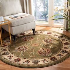 a living room area with a chair and rug