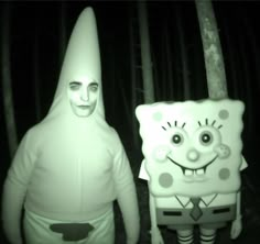 two people in costumes standing next to each other