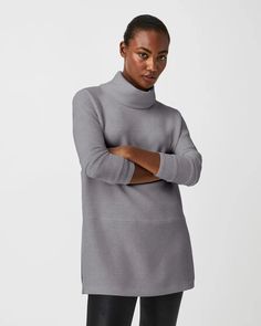 Introducing the AirEssentials Collection: comfort so luxurious, you'll never want to take it off! Made with lightweight and silky spacer fabric, this collection offers unparalleled softness and drapiness. Perfect for anywhere you go, these pieces will leave you feeling pampered all day long. Details 4-way stretch Turtleneck Tunic length 50501R Materials 47% Modal 46% Polyester 7% Elastane Care Machine wash cold, gentle cycle Tumble dry low Turtleneck Tunic, Tunic Designs, Knit Structure, Wedge Heel Boots, Button Outfit, Grey Turtleneck, Turtleneck Top, Athleisure Wear, Long Tunic