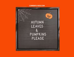 a sign that says autumn leaves and pumpkins please with a spider web on it