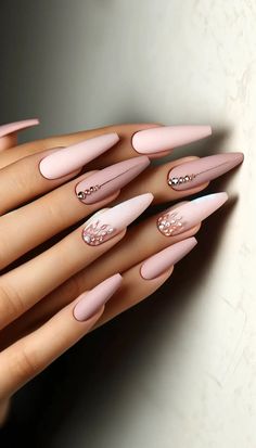 DALL·E 2024 05 21 16.52.28 A stylish set of coffin shaped nails with an elegant design. The nails are long and tapered with a soft matte finish in pastel pink. Each nail featur Soft Pink Long Nails, Nails 2024 Matte, Cute Matte Nails Ideas, Matt Finish Nails, Nude Coffin Nail Designs, Matte Pink Nails With Design, Rich Nails Design, Matt Pink Nails, Summer Long Nail Ideas