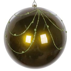 a brown ornament with green string on it