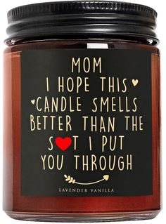 a candle that says mom i hope this candle smells better than the so i put you through