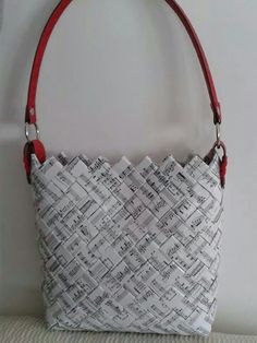 a white and red purse with musical notes on it