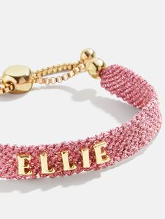 Our Metallic Custom Woven Friendship Bracelet offers an elevated take on the ever-loved friendship bracelet trend. The pink mesh band creates a metallic backdrop for graphic gold letter beads, which are sewn on by hand for this bracelet. Pick up one for you and a friend, then choose to add your name, initials, or a fav Birthday Gift Friend, Birthday Friendship Bracelet, Birthday Ideas For Friends, Birthday Gifts Best Friend, Trendy Custom Name Pink Bracelet, Customizable Playful Pink Friendship Bracelets, Trendy Pink Friendship Bracelets As Personalized Gifts, Trendy Pink Custom Name Bracelets, Trendy Personalized Pink Friendship Bracelets