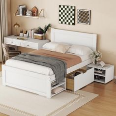 a white bed with drawers underneath it in a bedroom