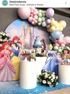 there are many balloons and princesses on the table