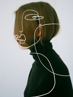 a woman's head with lines drawn on it