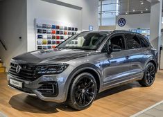 the new volkswagen suv is on display at an auto show