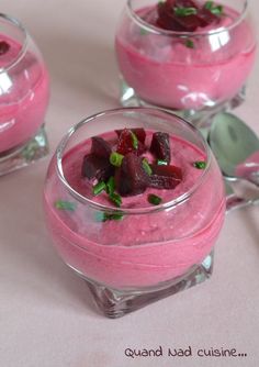 three desserts in small glass dishes with spoons