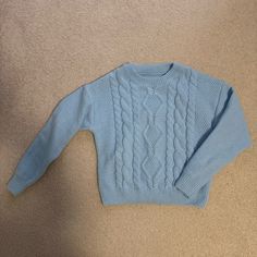 Light Blue Sweater Knit Size Small Cozy Perfect Winter Piece Never Worn Trendy Blue Acrylic Tops, Casual Chunky Knit Sweater In Acrylic Yarn, Blue Knitted Sweater For Fall, Light Blue Knit Sweater For Winter, Casual Knitted Acrylic Sweater, Casual Blue Cropped Sweater For Winter, Casual Acrylic Yarn Knitted Sweater, Light Blue Soft Knit Sweater For Fall, Cozy Blue Sweater With Crew Neck