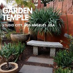 garden temple in studio city, los angeles usa with stone bench and succulents