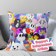 a pillow with an image of cartoon characters on it and the words support independent artists