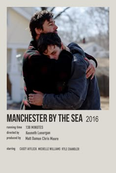 the poster for manchester by the sea shows two men hugging each other in front of a house