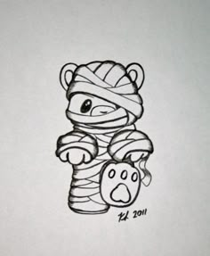 an ink drawing of a teddy bear wrapped in bandages and holding a ball of yarn