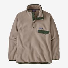 Warm and durable, the Patagonia Men's Synchilla® Snap-T® Fleece Pullover in Seabird Grey is a recycled polyester pullover that is what made fleece famous, with a classic Snap-T pocket and placket. Made with 100% recycled polyester double-sided fleece that feels soft, traps heat and dries quickly; with a 100% recycled nylon faille chest pocket Classic pullover Snap-T styling includes a four-snap recycled nylon front placket for easy venting and a stand-up collar for soft warmth on your neck Left-chest patch pocket holds the day’s essentials: it has a flap with a snap closure for security Y-Joint sleeves for increased mobility through the shoulders and the arms The cuffs and the hem are trimmed with shape-holding, abrasion-resistant spandex to seal out cool air and feel soft and comfortable Patagonia Sale, Patagonia Quarter Zip, Fleece Men, Patagonia Pullover, Patagonia Synchilla, Patagonia Fleece, Mens Fleece, Pullover Men, Cozy Sweaters