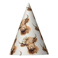 a party hat with an image of a cow on it