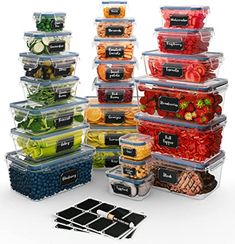 a stack of plastic containers filled with different types of vegetables and fruits in each container