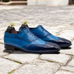 Handmade Two-Tone Blue Wingtip Oxford Leather Shoes | Men's Business & Office Wear | Unique men's leather shoes | Comfortable men's leather dress shoes Description Elevate your professional style with these Handmade Two-Tone Blue Wingtip Oxford Leather Shoes. Designed for the modern gentleman, these Oxfords feature a sleek business toe and classic wingtip detailing, making them the perfect choice for office wear and business occasions. Crafted from premium leather with a unique two-tone blue fin Professional Style, Wingtip Oxford, Leather Oxford Shoes, Leather Dress Shoes, Modern Gentleman, Business Formal, Shoes Comfortable, Professional Fashion, Leather Shoes Men