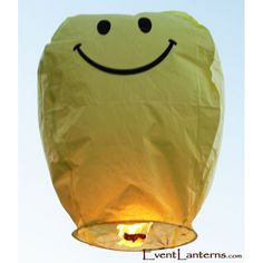 a paper lantern with a smiley face on it