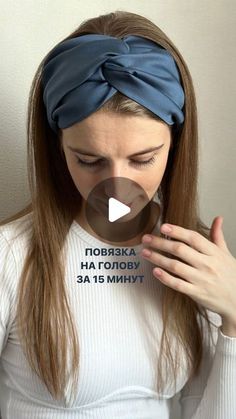 a woman wearing a white shirt with a blue headband on her head and the words,