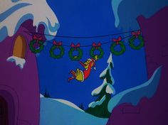 an animated christmas scene with santa claus hanging from a clothes line